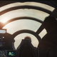 Luthen pilots his ship as Andor watches